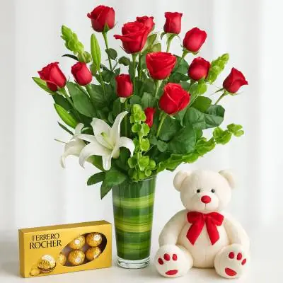 Jarrón Todo para Ti - Jarrones - Quieres que ese ser amado reciba lo mejor? este combo es ideal para generar una gran impresión, se compone de un jarrón de vidrio con 13 rosas rojas, 2 lirios blancos y follajes verdes, acompañados de una caja de chocolates Ferrero Rocher por 8 unidades y un oso de peluche. (Los productos adicionales como peluches y chocolates pueden variar según disponibilidad). Sugerimos que acompañes este diseño con chocolates, peluches, globos o vinos para hacer aún más especial tu detalle, en el siguiente paso de la compra puedes agregar a tu orden estos productos si lo deseas. - Floresco